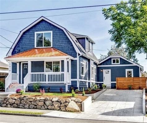 copper metal roof blue house|blue metal roof exterior home.